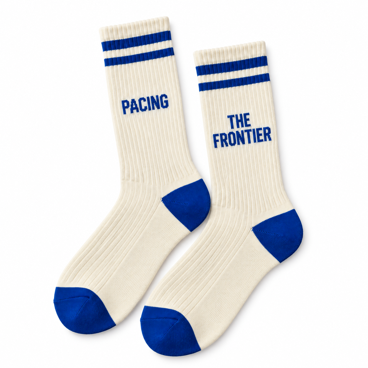 Ivory crew socks with cobalt toes, heels, and Pacing the Frontier lettering